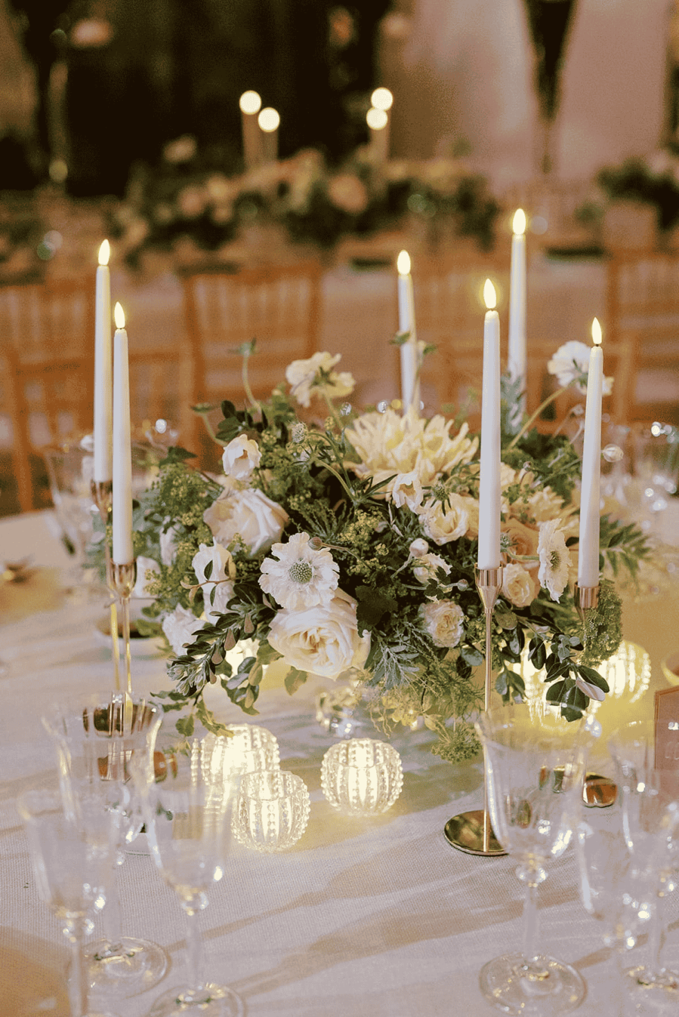 Floral Centerpieces with candles at Natural History Museum